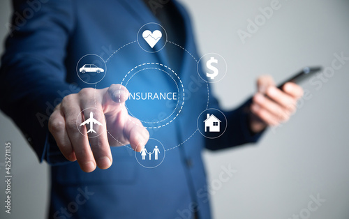 man holding phone with insurance icon