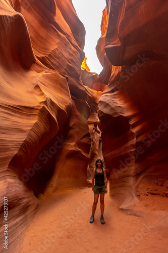 A young woman on the Lower Antelope Arizona trail. USA