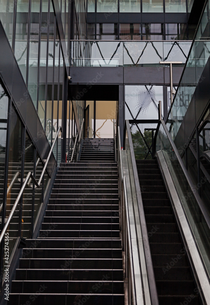 Obraz premium Budapest, Hungary - May 27, 2019: stairs and escalator to shopping mall