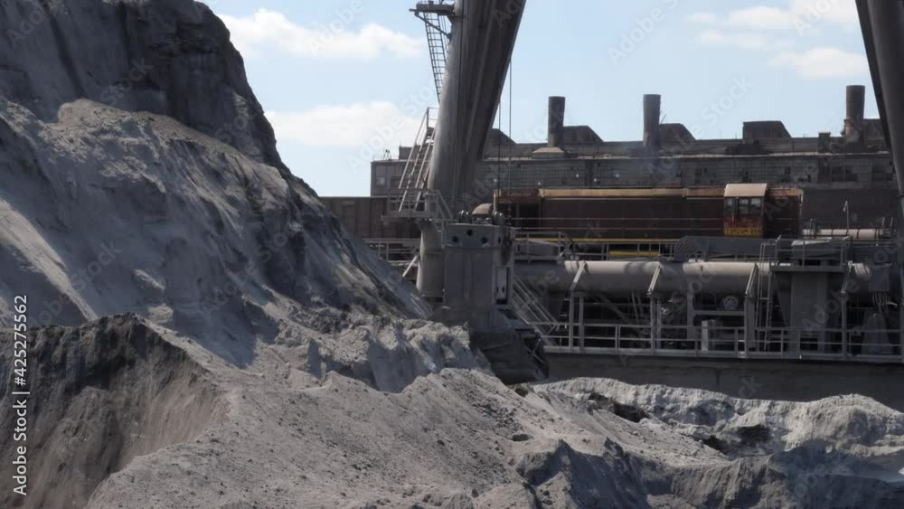The ore yard of the steelworks. The locomotive is going to the factory. The ore yard of the steelworks. The locomotive is going to the factory.