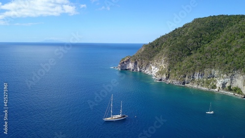 aerial view of a sailing ship in Guadeloupe close to the coast