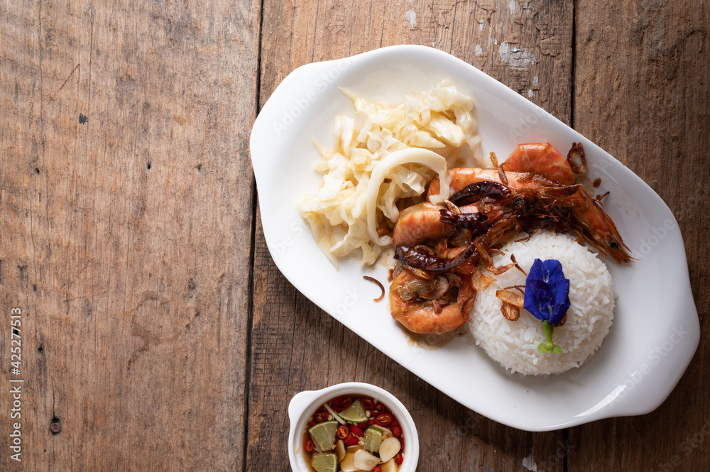 Stir Fried Shrimp with Tamarind Sauce with Rice with studio light delicious looking.