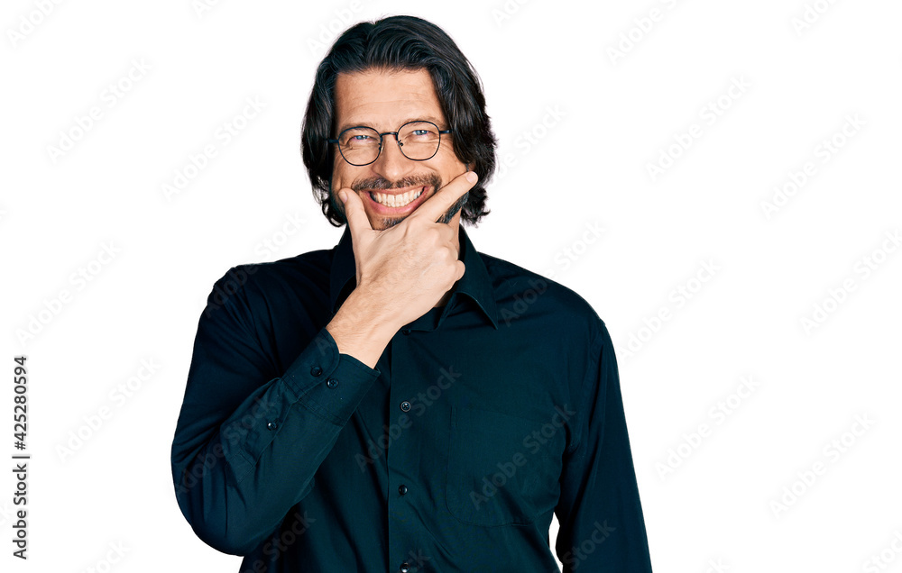 Middle age caucasian man wearing casual clothes and glasses looking confident at the camera smiling with crossed arms and hand raised on chin. thinking positive. Middle age caucasian man wearing casual clothes and glasses looking confident at the camera smiling with crossed arms and hand raised on chin. thinking positive.