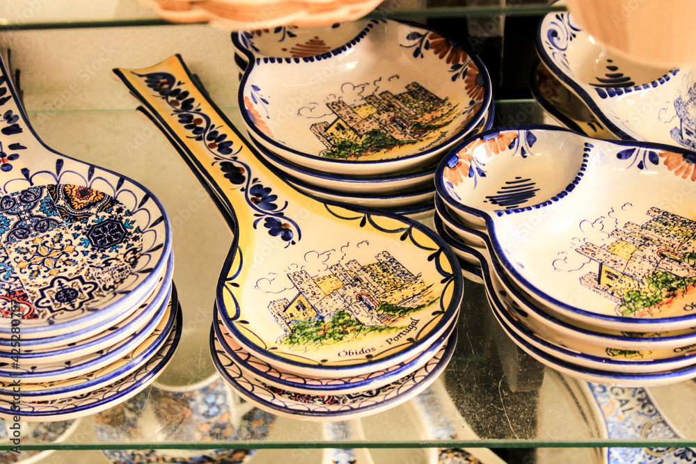 Colorful ceramic souvenirs for sale in Obidos village