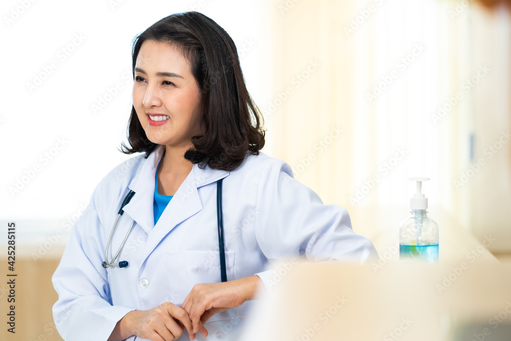Young caucasian doctor in green surgical gown. Surgeon in operating room at hospital Young caucasian doctor in green surgical gown. Surgeon in operating room at hospital