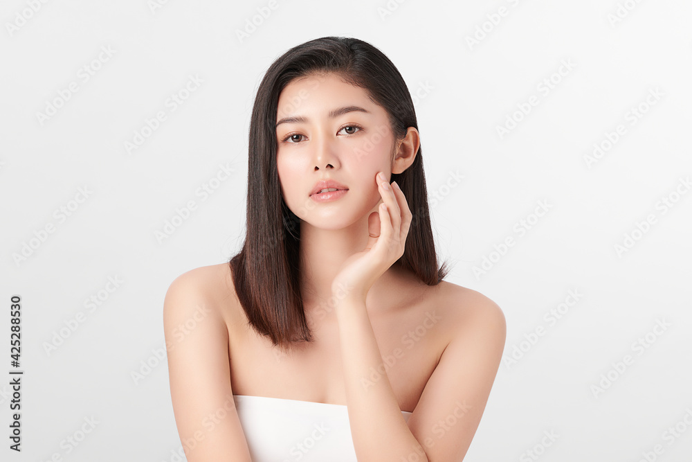 Beautiful young asian woman with clean fresh skin on white background, Face care, Facial treatment, Cosmetology, beauty and spa, Asian women portrait Beautiful young asian woman with clean fresh skin on white background, Face care, Facial treatment, Cosmetology, beauty and spa, Asian women portrait