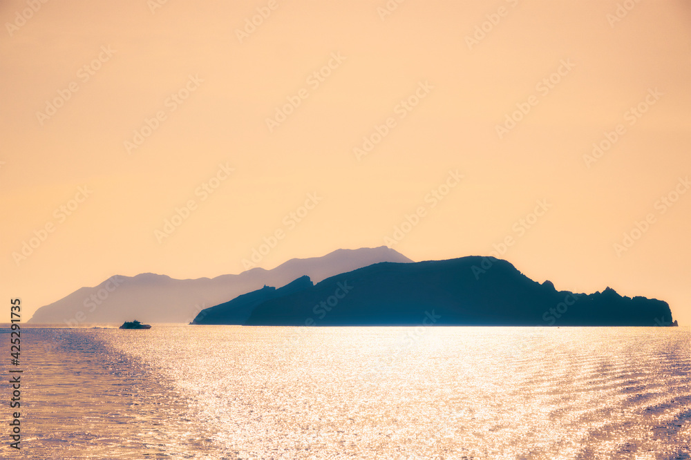 Cyclades islands silhouettes in Aegean sea