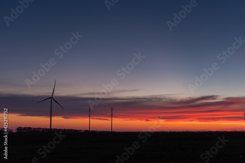 wind generators at sunset, alternative