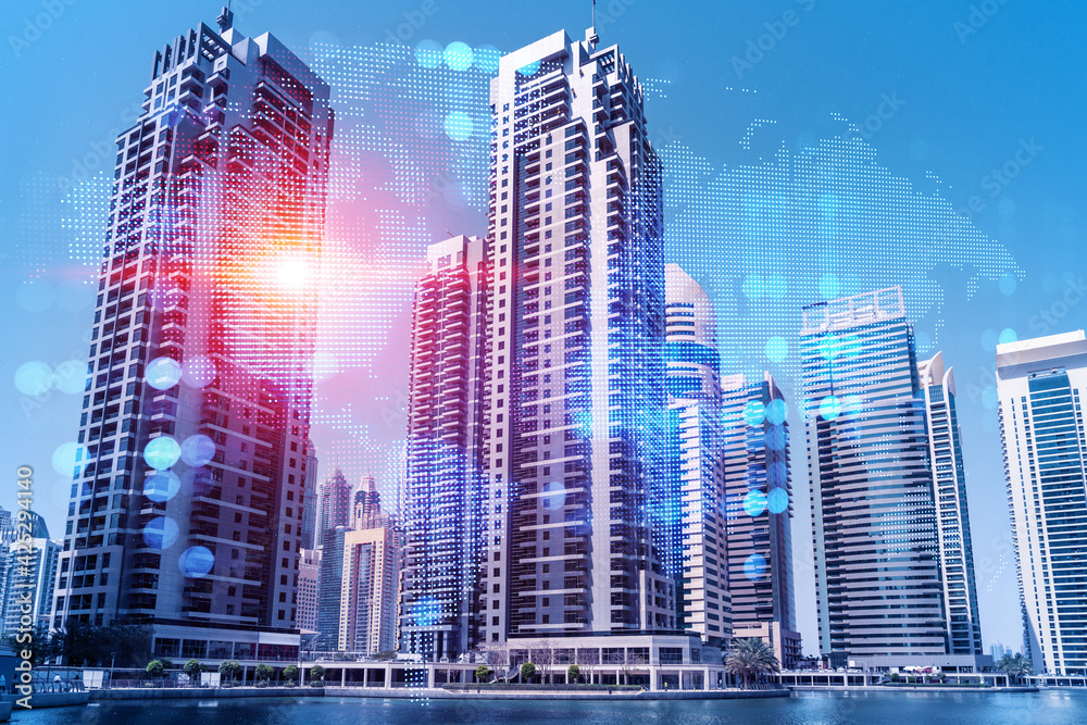 Obraz premium Skyscrapers of Dubai business downtown. International hub of trading and financial services. Social network icons hologram, concept of people connection. Double exposure. Dubai Canal waterfront.
