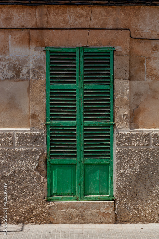 Fototapeta premium green window with shutters