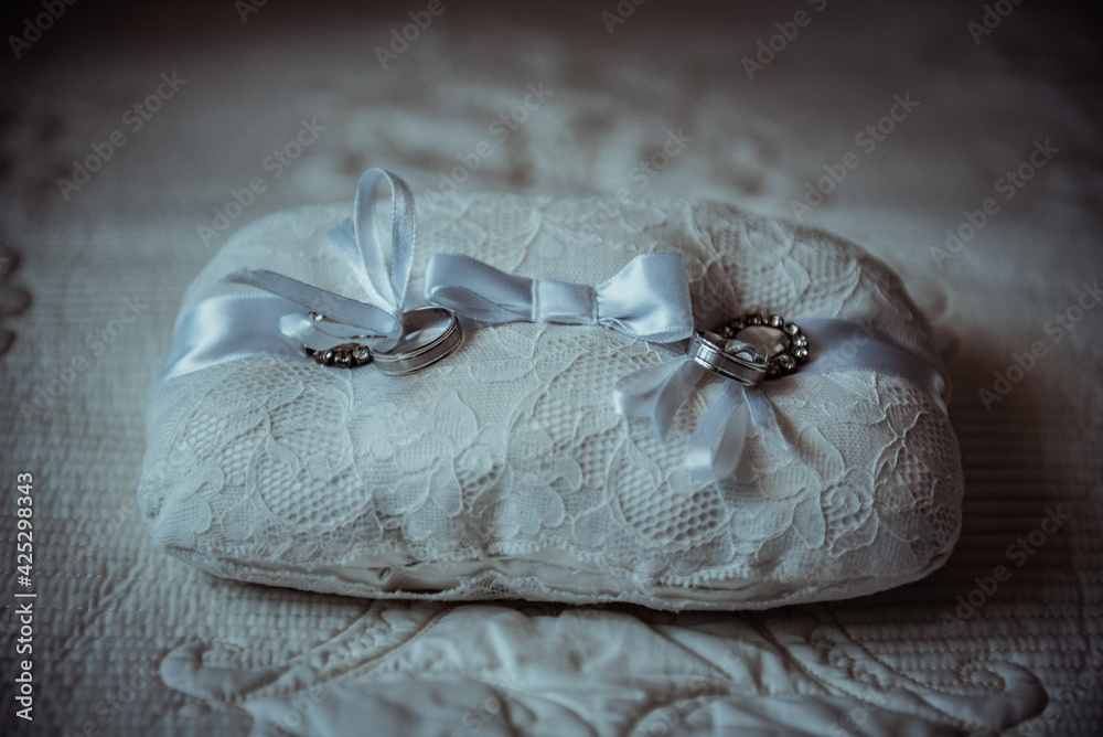 Obraz premium pillow with wedding rings