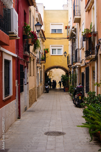 Colored cute spanish little street in a small village of east Spain. © Miguel