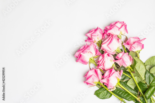 A bouquet of gentle pink roses isolated on white background © FuzullHanum