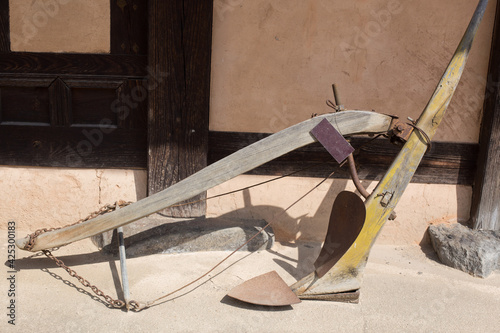 Vintage horse plow isolated on white background.