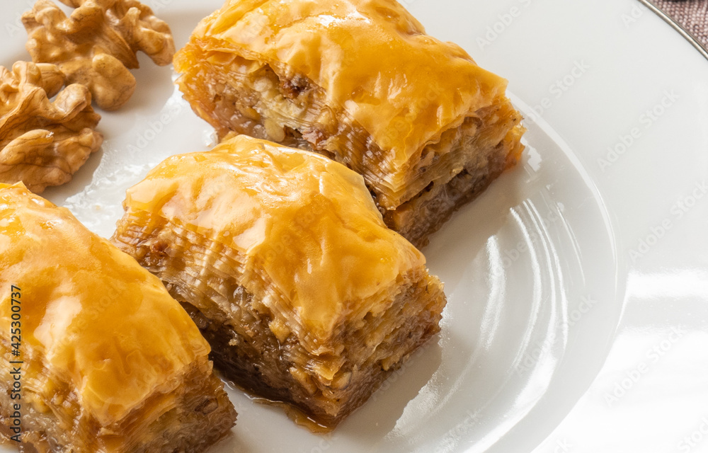 Close up shot to walnut baklava Close up shot to walnut baklava