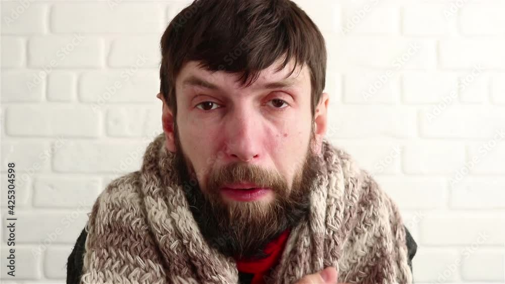 sick bearded man sneezing feeling cold close up sick bearded man sneezing feeling cold close up