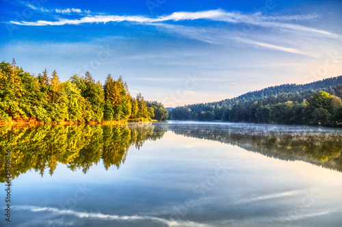 Fototapeta Naklejka Na Ścianę i Meble -  View at lake Dreiburgensee near Tittling, bavarian forest, after sunrise
