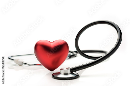 Stethoscope and heart symbol isolated on white background.