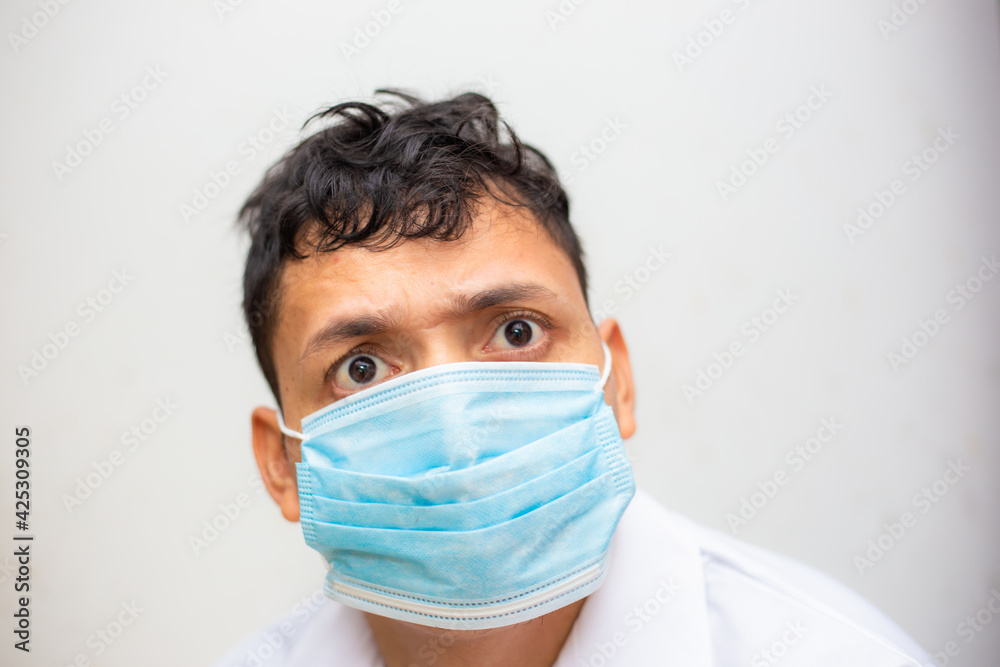 Young asian men wear surgical mask on white background Young asian men wear surgical mask on white background