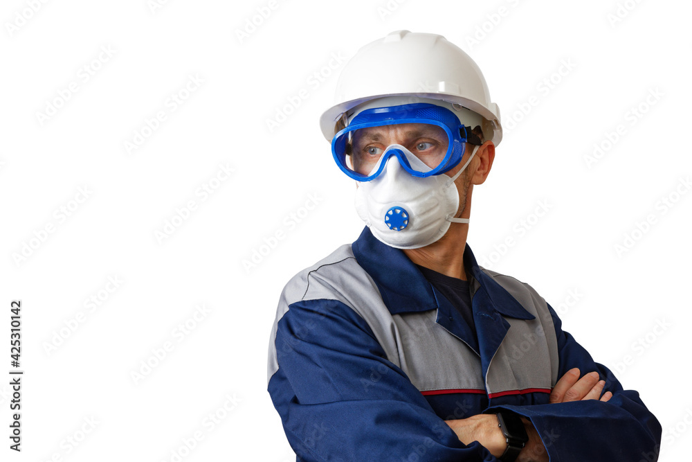 Portrait of a man in a work clothes, white construction helmet, respirator and protective glasses, isolated on white. Copyspace. Portrait of a man in a work clothes, white construction helmet, respirator and protective glasses, isolated on white. Copyspace.