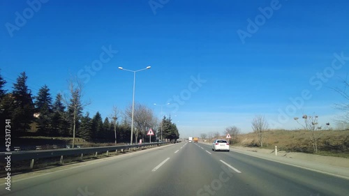 Slow hyperlapse driving ring road inside the car.
