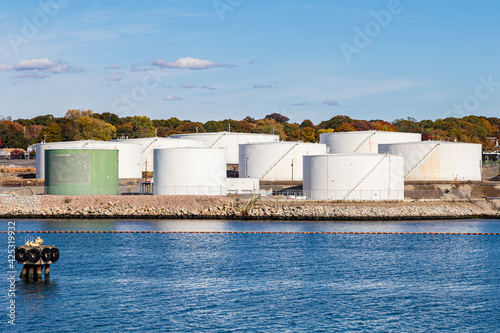 view to skyline of Groton from the seaside with view to industrial area with tank farm photo