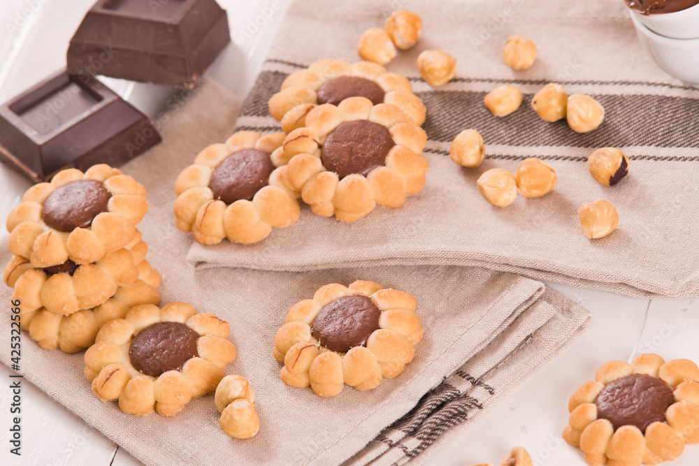 Flower shaped chocolate biscuits.
