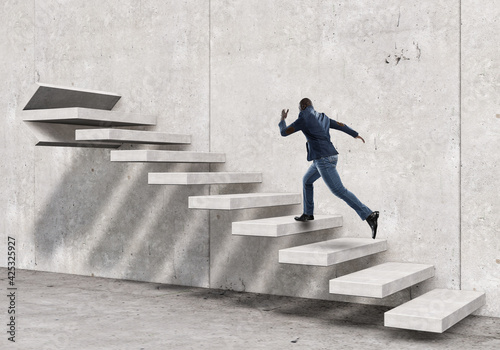 Image of businessman walking upstairs