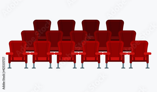 Auditorium and rows of red comfortable armchairs in the cinema.