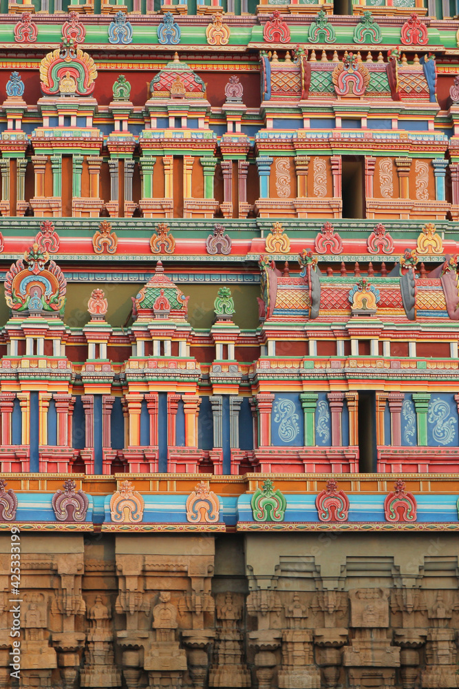 Background - painting of the walls of gopuram of the South Indian temple in Dravidian style.
