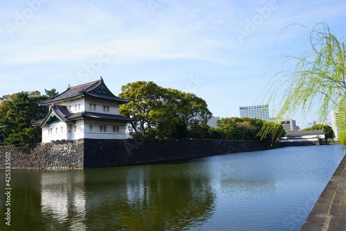 Tokyo, Japan - March 2021: Sakurada tatsumi yagura (Sakurada-niju-yagura) at Imperial palace during spring in Tokyo, Japan - 江戸城 桜田巽櫓 (桜田二重櫓) 皇居 外濠