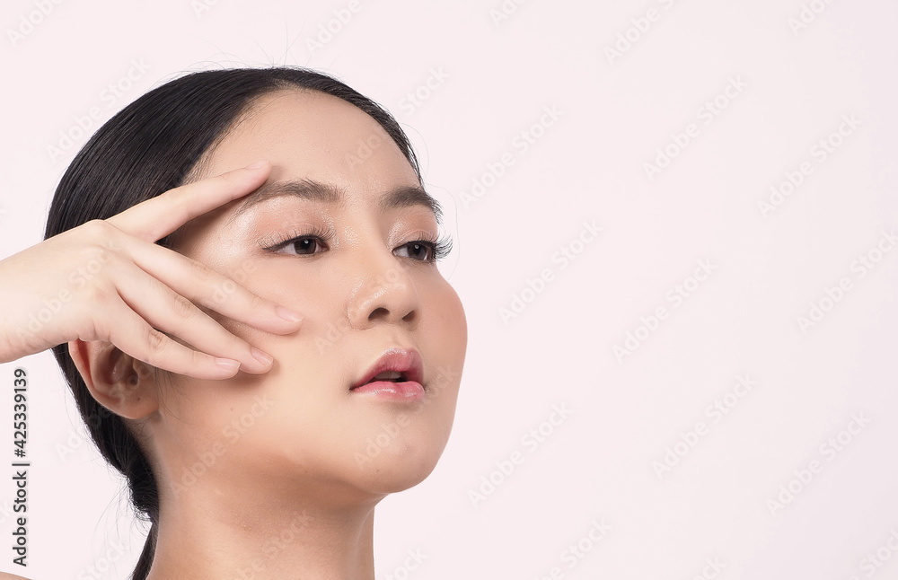 Beauty skin. makeup concept. Young pretty woman black hair and beauty face make up for skincare cosmetic. Showing delicate soft and firm and ageless facial skin. Oil type skin. Close up facial. 