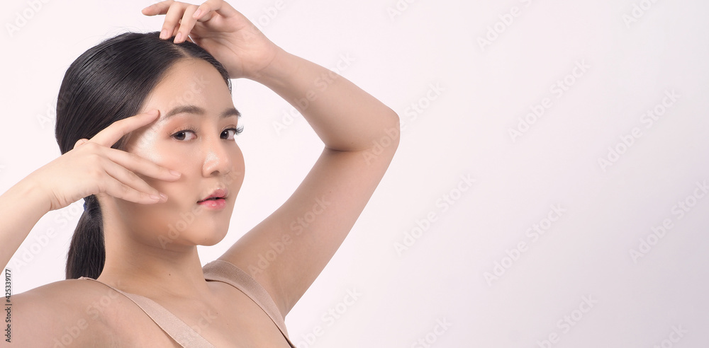 Beauty skin. makeup concept. Young pretty woman black hair and beauty face make up for skincare cosmetic. Showing delicate soft and firm and ageless facial skin. Oil type skin. Close up facial. Beauty skin. makeup concept. Young pretty woman black hair and beauty face make up for skincare cosmetic. Showing delicate soft and firm and ageless facial skin. Oil type skin. Close up facial.