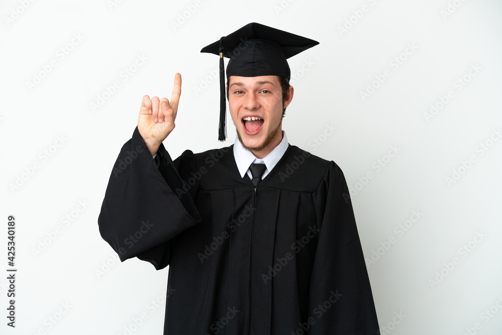 Young university Russian graduate isolated on white background pointing up a great idea Young university Russian graduate isolated on white background pointing up a great idea