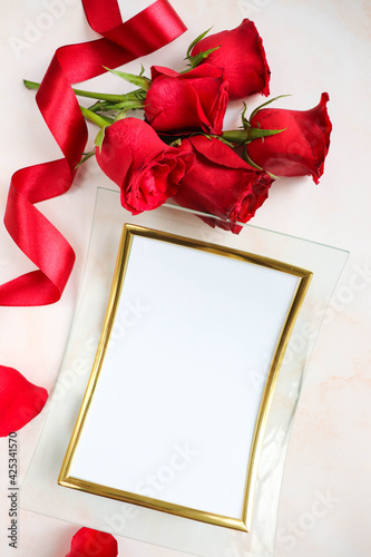 mockup greeting card. beautiful bouquet of roses and white blank for text 