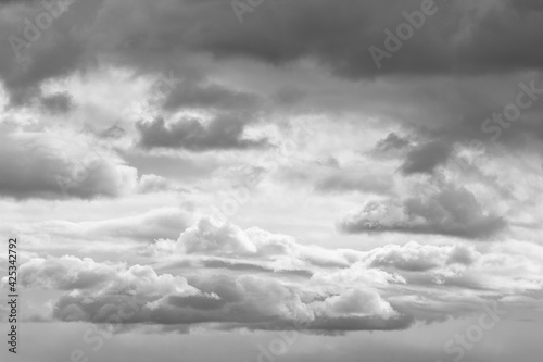 Atmosphere image with white and dark grey clouds