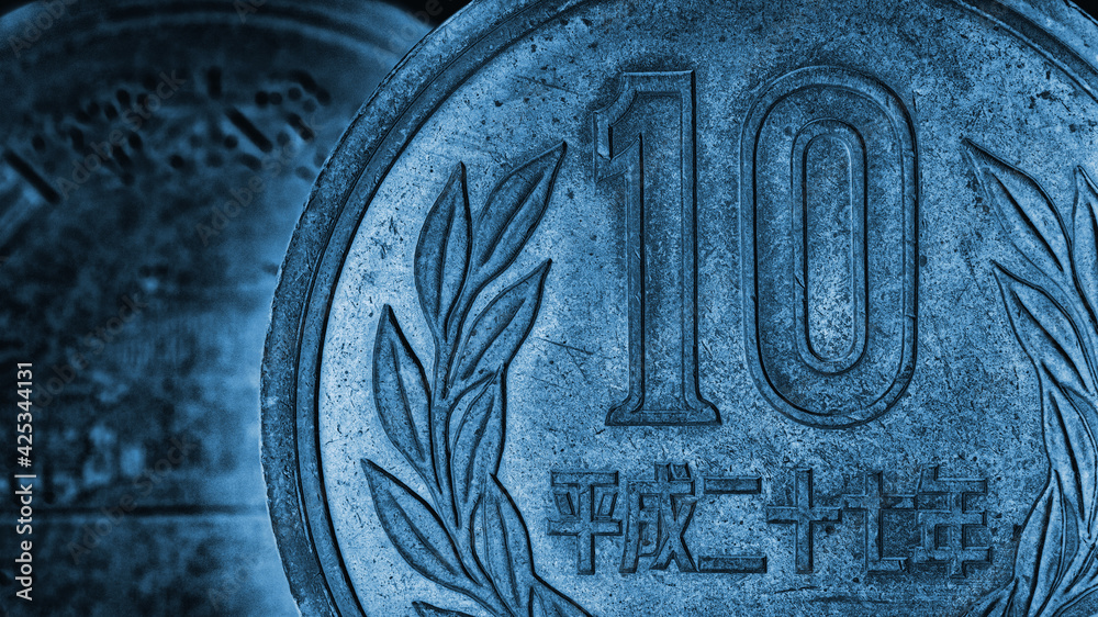 Translation: Japan 2015. Japanese coin of 10 yen close-up. Dark blue tinted illustration or wallpaper. Background or backdrop about money, economy, finance, taxes and financial management. Macro