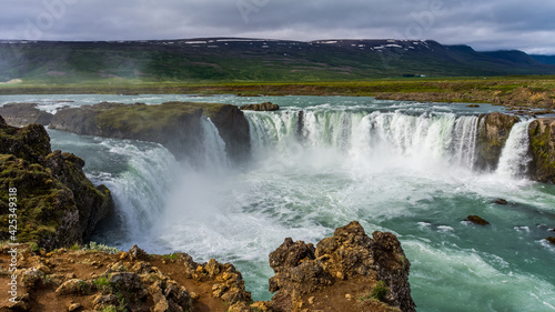 view of the majestic Godafoss waterfall near the city of Akureyri during summer season 