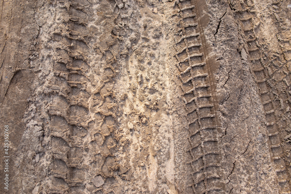 drawing of car tires on the sand drawing of car tires on the sand