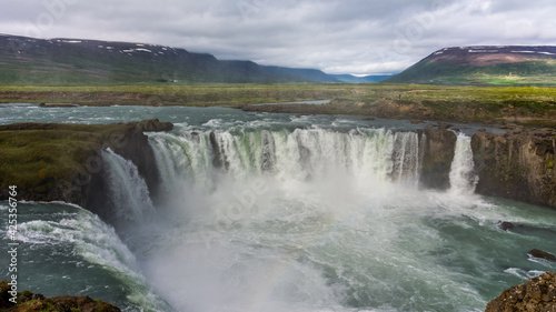 view of the majestic Godafoss waterfall near the city of Akureyri during summer season 