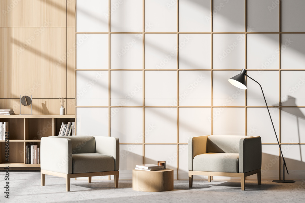 Waiting room interior with two comfortable armchairs and bookcase Waiting room interior with two comfortable armchairs and bookcase