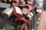 Rusty love locks on a bridge in the Hafencity, Hamburg