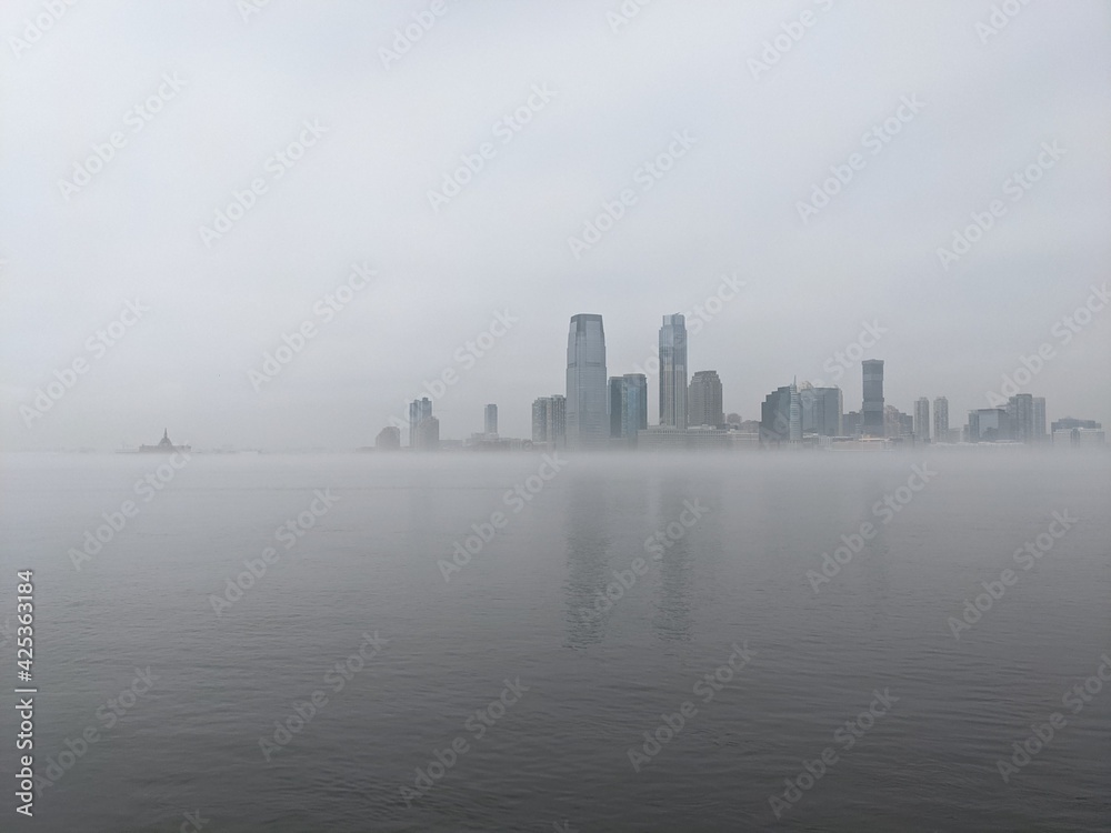 Fog over Jersey City & the Hudson river from Downtown New York - March 2021