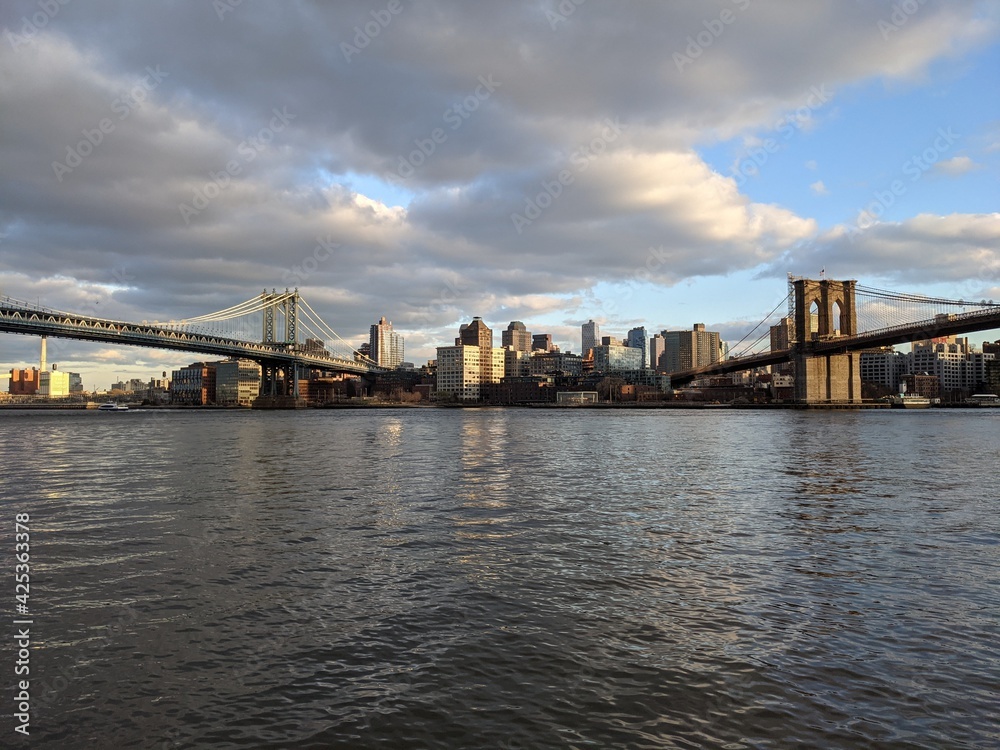 Evening sun over the Brooklyn & Manhattan Bridges, New York - March 2021
