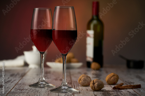 Wine and nuts on the table. High quality photo