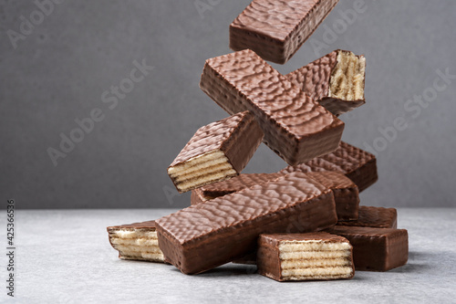 Falling waffle chocolate bar, heap of wafer photo