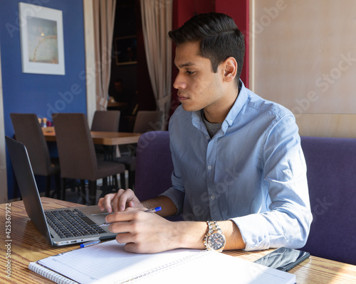 man working on laptop. Freelance distant job concept