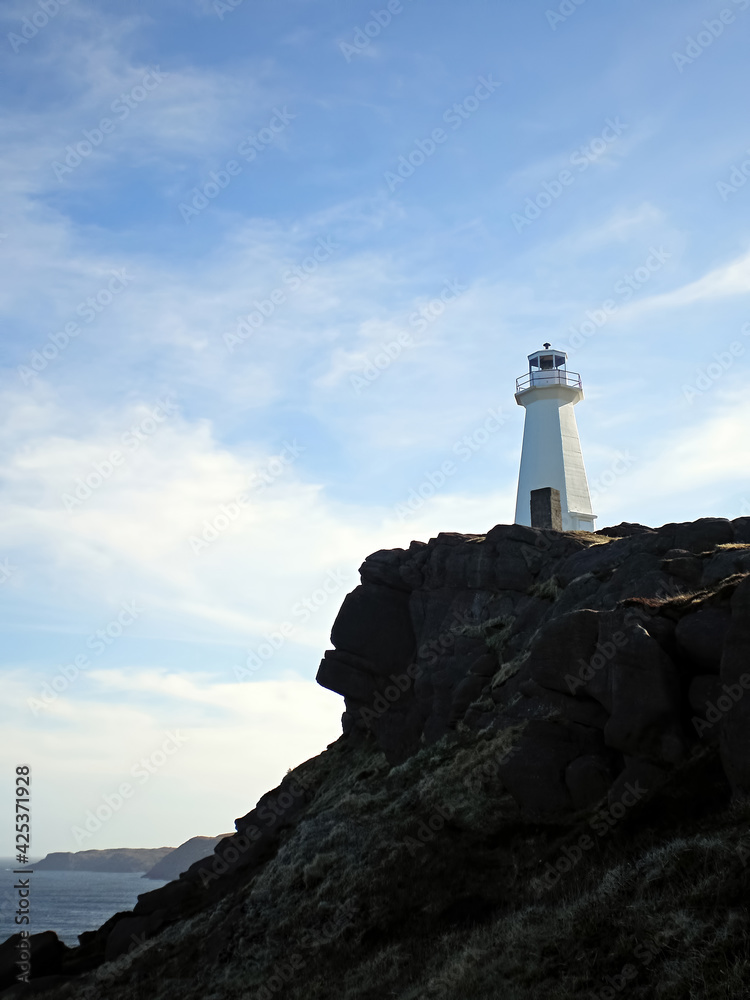 Cape Spear lighthouse rises over the cliff in St. John's, Newfoundland. Cape Spear lighthouse rises over the cliff in St. John's, Newfoundland.