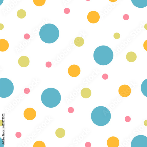 Seamless pattern with the image of colored circles on a white background. Colored vector background for textile decoration, gift wrapping, souvenir products, children's room.