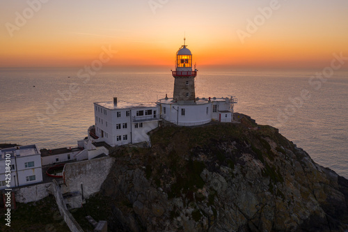 Aerial view of Howth Lighthouse at sunrise, beautiful Irish coastline Lighthouse. © Ire DronePhotography
